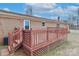 Back deck with wooden railings and stairs at 105 Kiser Ln, Statesville, NC 28677