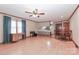 Open dining area with hardwood floors and kitchen bar at 105 Kiser Ln, Statesville, NC 28677