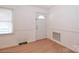 Bright entryway with white door and wood flooring at 105 Kiser Ln, Statesville, NC 28677