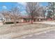 Brick ranch house with carport and storage shed in backyard at 105 Kiser Ln, Statesville, NC 28677
