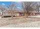 Brick ranch house with carport and rocking chairs on the porch at 105 Kiser Ln, Statesville, NC 28677