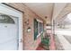 Brick front porch with rocking chairs and street view at 105 Kiser Ln, Statesville, NC 28677