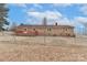 Brick house with wooden deck and fenced backyard at 105 Kiser Ln, Statesville, NC 28677