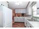 Bright kitchen features ample cabinetry and a sizable double sink at 105 Kiser Ln, Statesville, NC 28677