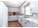 Bright kitchen features ample cabinetry and a sizable double sink at 105 Kiser Ln, Statesville, NC 28677