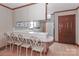 Kitchen boasts a breakfast bar and modern white cabinets at 105 Kiser Ln, Statesville, NC 28677