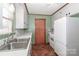 Efficient kitchen featuring ample counter space and white appliances at 105 Kiser Ln, Statesville, NC 28677