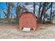 Red wooden storage shed in backyard at 105 Kiser Ln, Statesville, NC 28677