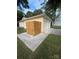 Double garage with extra parking space and some trees nearby at 11800 Five Cedars Rd, Charlotte, NC 28226
