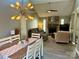 Inviting living room featuring a cozy stone fireplace and comfortable seating at 11800 Five Cedars Rd, Charlotte, NC 28226