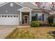 Gray house with white garage door and wreath at 193 Willow Valley Dr, Mooresville, NC 28115