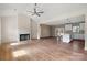 Spacious living room featuring hardwood floors, a fireplace, recessed lighting, and access to the kitchen at 6249 Hayden Dr, Hickory, NC 28601