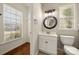 Bright bathroom offers lots of natural light and tiled floors at 13929 Tilesford Ln, Huntersville, NC 28078
