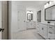Bathroom with white cabinets, dual vanities, framed mirrors, and tile floors at 2237 Millennium Dr # 012, Lancaster, SC 29720