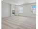 Bright bonus room with neutral carpet, white walls and trim, and natural light at 2237 Millennium Dr # 012, Lancaster, SC 29720