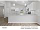 Bright, modern kitchen featuring granite countertops and stainless steel appliances at 204 Lake George Dr, Shelby, NC 28152