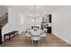 Bright dining area adjacent to the kitchen features a round table with four chairs at 208 Waterlynn Ridge Rd # B, Mooresville, NC 28117