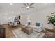 Bright open-concept living space with a dining area and kitchen in the background, perfect for entertaining at 208 Waterlynn Ridge Rd # B, Mooresville, NC 28117