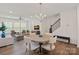 Open concept living room and dining area with lots of natural light and hardwood floors at 208 Waterlynn Ridge Rd # B, Mooresville, NC 28117