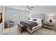 Bright bedroom with a ceiling fan, large window, bench and stylish decor at 208 Waterlynn Ridge Rd # B, Mooresville, NC 28117