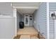 Covered patio featuring blue siding and a black grill at 208 Waterlynn Ridge Rd # B, Mooresville, NC 28117