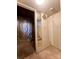 Unfinished basement area with stairs leading up and foil-covered wall at 7324 Pebblestone Dr # F, Charlotte, NC 28212