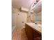 Functional bathroom with a single sink vanity and a shower-tub combo at 7324 Pebblestone Dr # F, Charlotte, NC 28212