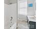 Bathroom with shower/tub combo, vanity, and window at 154 W End St, Chester, SC 29706