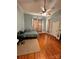 Large bedroom with hardwood floors and ceiling fan at 154 W End St, Chester, SC 29706