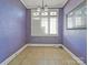 Simple dining room featuring tiled floors and large window at 154 W End St, Chester, SC 29706