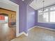Spacious dining room with purple walls and tile floor at 154 W End St, Chester, SC 29706
