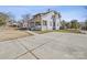 Two-story home with a spacious front yard and driveway at 154 W End St, Chester, SC 29706