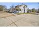 Two-story home with a long driveway and yard at 154 W End St, Chester, SC 29706