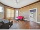 Living room featuring hardwood floors, fireplace and high ceilings at 154 W End St, Chester, SC 29706