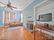 Living room with hardwood floors, fireplace and built-in shelving at 154 W End St, Chester, SC 29706