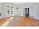 Living room with hardwood floors and an open doorway at 154 W End St, Chester, SC 29706