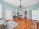 Spacious living room with hardwood floors, fireplace and high ceilings at 154 W End St, Chester, SC 29706