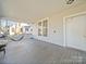 Front porch with wooden floor and hammock at 154 W End St, Chester, SC 29706