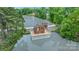 Breathtaking aerial view of a property featuring a private dock and lake access at 407 Crepe Myrtle Ln, Weddington, NC 28104