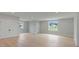 Spacious living area with hardwood floors and natural light at 407 Crepe Myrtle Ln, Weddington, NC 28104