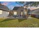 Backyard with a full patio, dining area, seating area, and fenced yard at 8225 Ballymore Ct, Huntersville, NC 28078