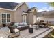 Backyard with a full patio, dining area, seating area, and fenced yard at 8225 Ballymore Ct, Huntersville, NC 28078