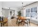 Bright and airy dining area with a stylish light fixture and comfortable seating at 8225 Ballymore Ct, Huntersville, NC 28078