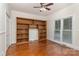 Bedroom with built-in shelving and ample natural light from a large window at 1047 Mallard Dr, Rock Hill, SC 29732