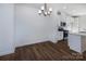 Dining area with hardwood floors and chandelier at 2212 Noble Townes Way, Charlotte, NC 28262
