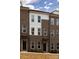 Modern brick townhome with white accents and landscaping at 2212 Noble Townes Way, Charlotte, NC 28262