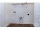 Functional laundry room with shelving and hookups at 2212 Noble Townes Way, Charlotte, NC 28262
