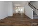 Open living space with hardwood floors and natural light at 2212 Noble Townes Way, Charlotte, NC 28262