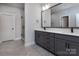 Modern bathroom with double vanity and walk-in shower at 2535 Irwin Stream Rd, Charlotte, NC 28208