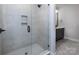 Large walk-in shower with glass enclosure and tile surround at 2535 Irwin Stream Rd, Charlotte, NC 28208